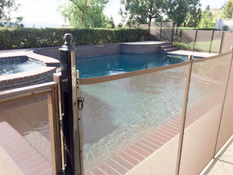 Secure Mesh Fence at Poolside